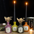 Set of 4 Potion Bottle Vases and Candle Holders